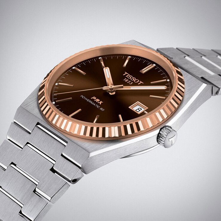 montre Tissot avec un boîtier en or rose sur acier, un cadran brun et un diamètre de 40 mm