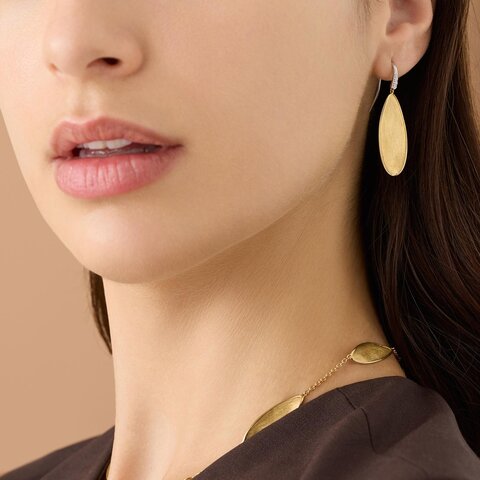 boucles d'oreilles Marco Bicego en or jaune 18 ct avec brillant entouré de briljants de 0,04 karaat
