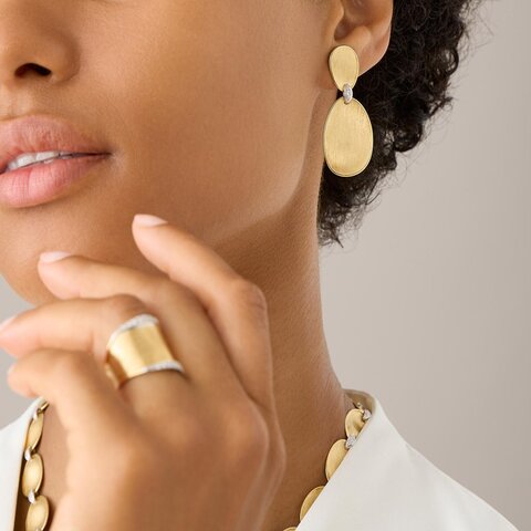 boucles d'oreilles Marco Bicego en or jaune 18 ct avec brillant de 0.04 carat