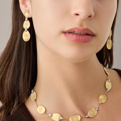 boucles d'oreilles Marco Bicego en or jaune 18 ct avec brillant de 0.07 carat