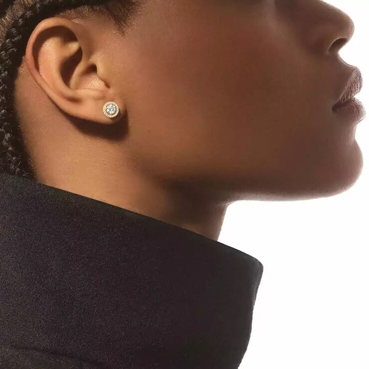 Messika oorringen in geel goud 18kt met briljant van 0,50 karaat als hoofdsteen omringd door briljanten van 0,14 karaat