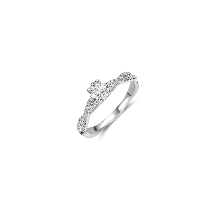 The Exclusive Collection verlovingsring in wit goud 18kt met ovalen diamant van 0,32 karaat als hoofdsteen omringd door briljanten van 0,18 karaat