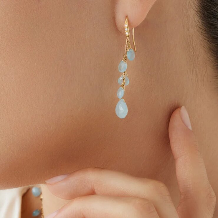 Marco Bicego oorringen in geel goud 18kt met aquamarijn omringd door briljanten van 0,04 karaat