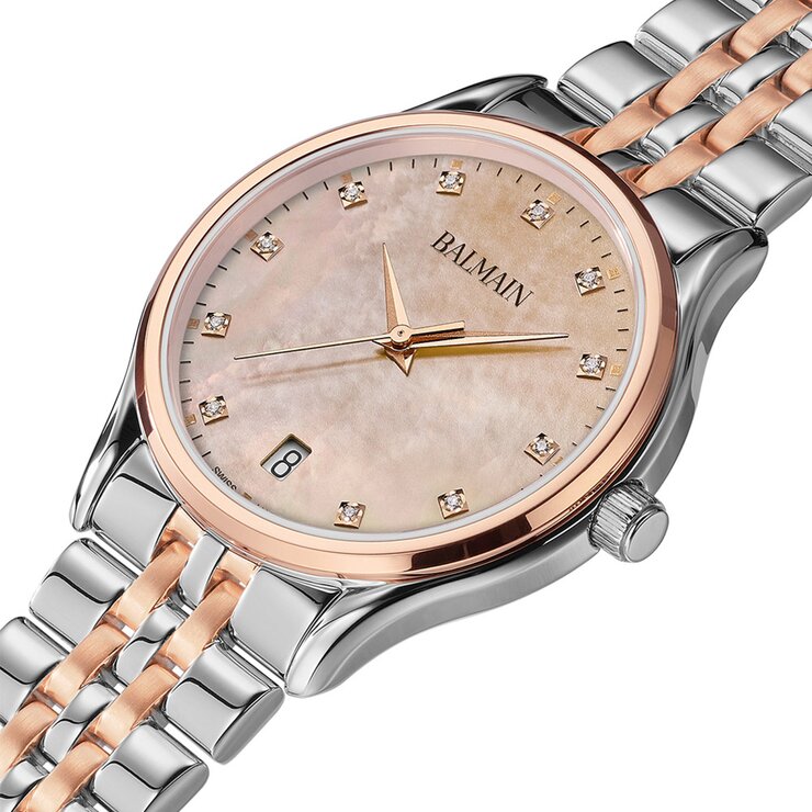 montre Balmain avec un boîtier en revêtement pvd rose sur acier, un cadran nacre avec brillant et un diamètre de 32 mm
