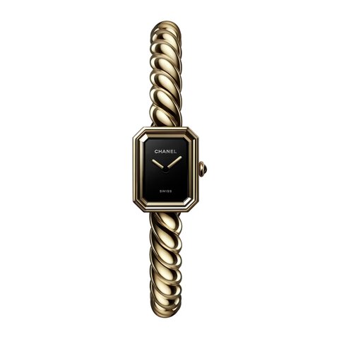 montre CHANEL avec un boîtier en or jaune, un cadran noir et un diamètre de 19.7 x 15.2 mm