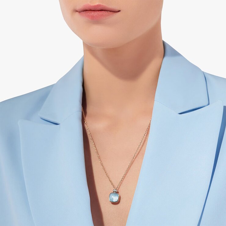 collier Pomellato en or rose 18 ct avec topaze bleue entouré de briljants de 0,11 karaat