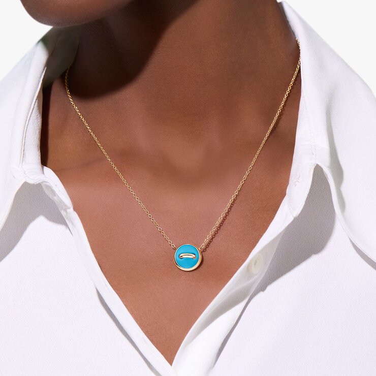 collier Pomellato en or rose 18 ct avec turquoise entouré de briljants de 0,05 karaat