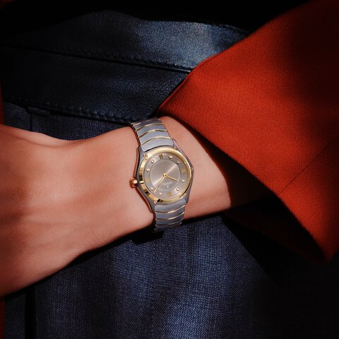 Ebel horloge met een kast in geel goud op staal, met een wijzerplaat in het bruin met briljant en een diameter van 29 mm