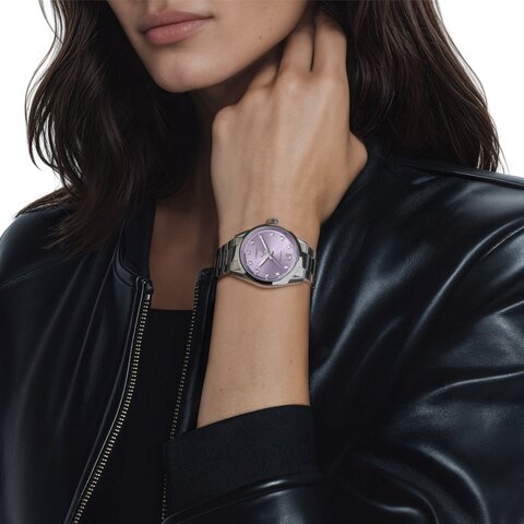 TAG Heuer horloge met een kast in staal, met een wijzerplaat in het paars met briljant en een diameter van 36 mm
