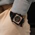 montre TAG Heuer avec un boîtier en titane, un cadran noir et un diamètre de 39 mm - thumb
